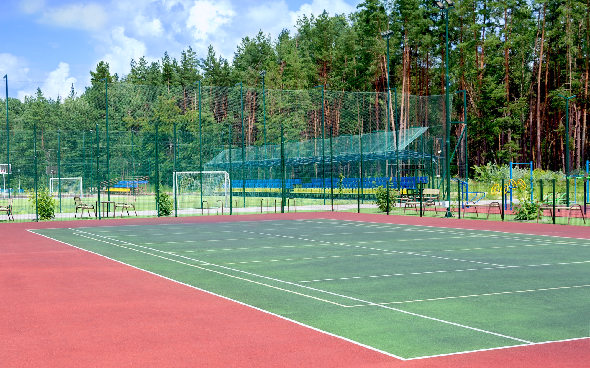 Sports ground on the outskirts of the city in a wooded area