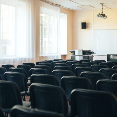 Empty school assembly hall for meetings and presentations, school education