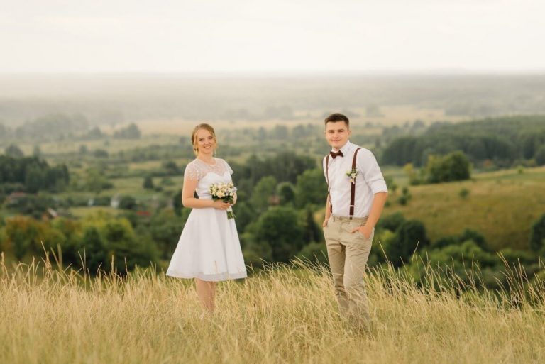 optimize- loving-couple-posing-against-beautiful-view-wedding-day-bride-groom